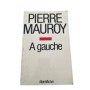 À gauche